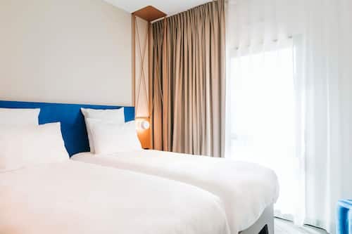 Privilege, Habitación, 2 camas individuales | Minibar, caja fuerte, escritorio y sistema de insonorización