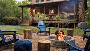 A wooden cabin with a fire pit and outdoor seating. - Shenandoah Log Cabin *Hot Tub* *Indoor Fireplace* (Dyke)