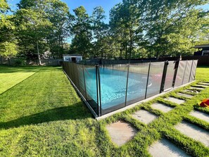 Outdoor pool, a heated pool - Chic Hamptons Home with Heated Gated Pool and Grill (Hampton Bays)