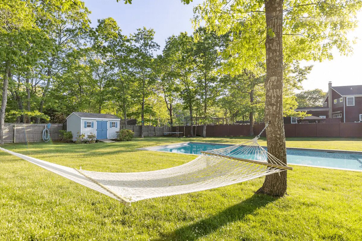 Chic Hamptons Home with Heated Gated Pool and Grill