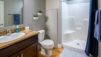 Combined shower/tub, hair dryer, towels, soap