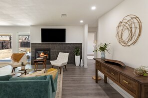 TV, fireplace, computer monitors - Modern & Spacious Oasis Minutes from Downtown (Austin)