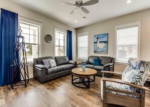 House, 4 Bedrooms | Living room - 5514 Gulf Drive by Forehand Rentals (Panama City Beach)