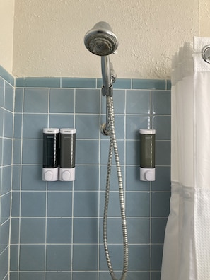 Combined shower/tub, hair dryer, towels, soap
