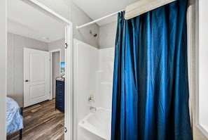 Combined shower/tub, hair dryer, towels, soap