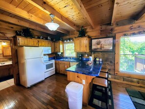 Microwave, dishwasher, coffee/tea maker, cookware/dishes/utensils