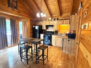 Microwave, dishwasher, coffee/tea maker, cookware/dishes/utensils