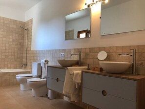Bathtub, hair dryer, bidet, soap
