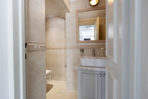 Shower, hair dryer, soap, shampoo