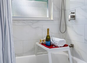Bathtub, hair dryer, towels
