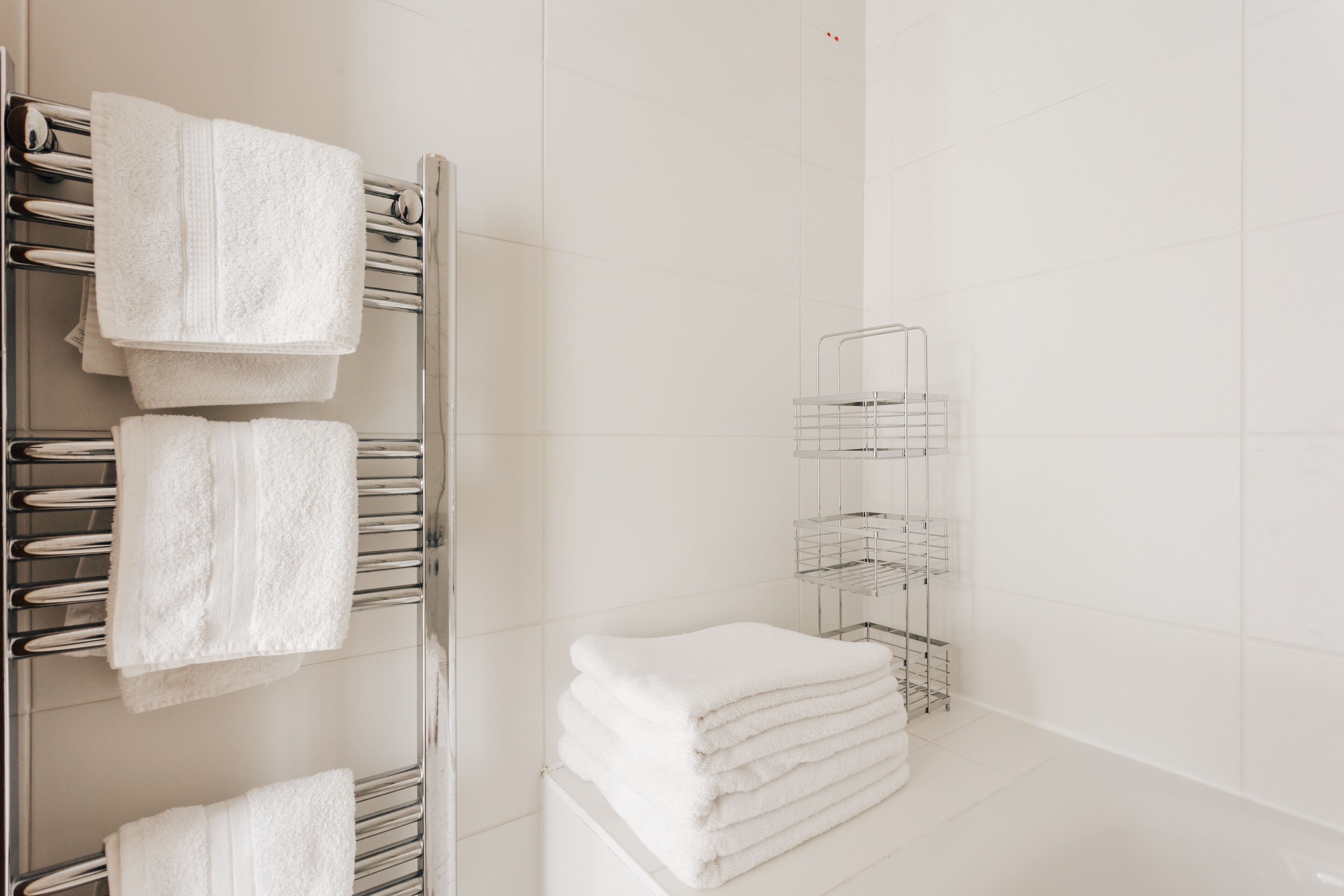 Combined shower/tub, hair dryer, towels, soap