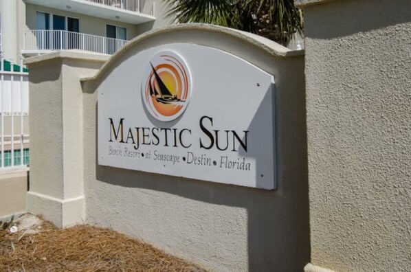 A sign for Majestic Sun Beach Resort & Seascape Destin, Florida.