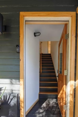 Luxury Suite | Living area | 32-inch Smart TV with cable channels, TV, iPad