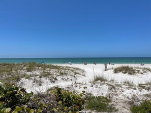 On the beach, sun-loungers, beach towels