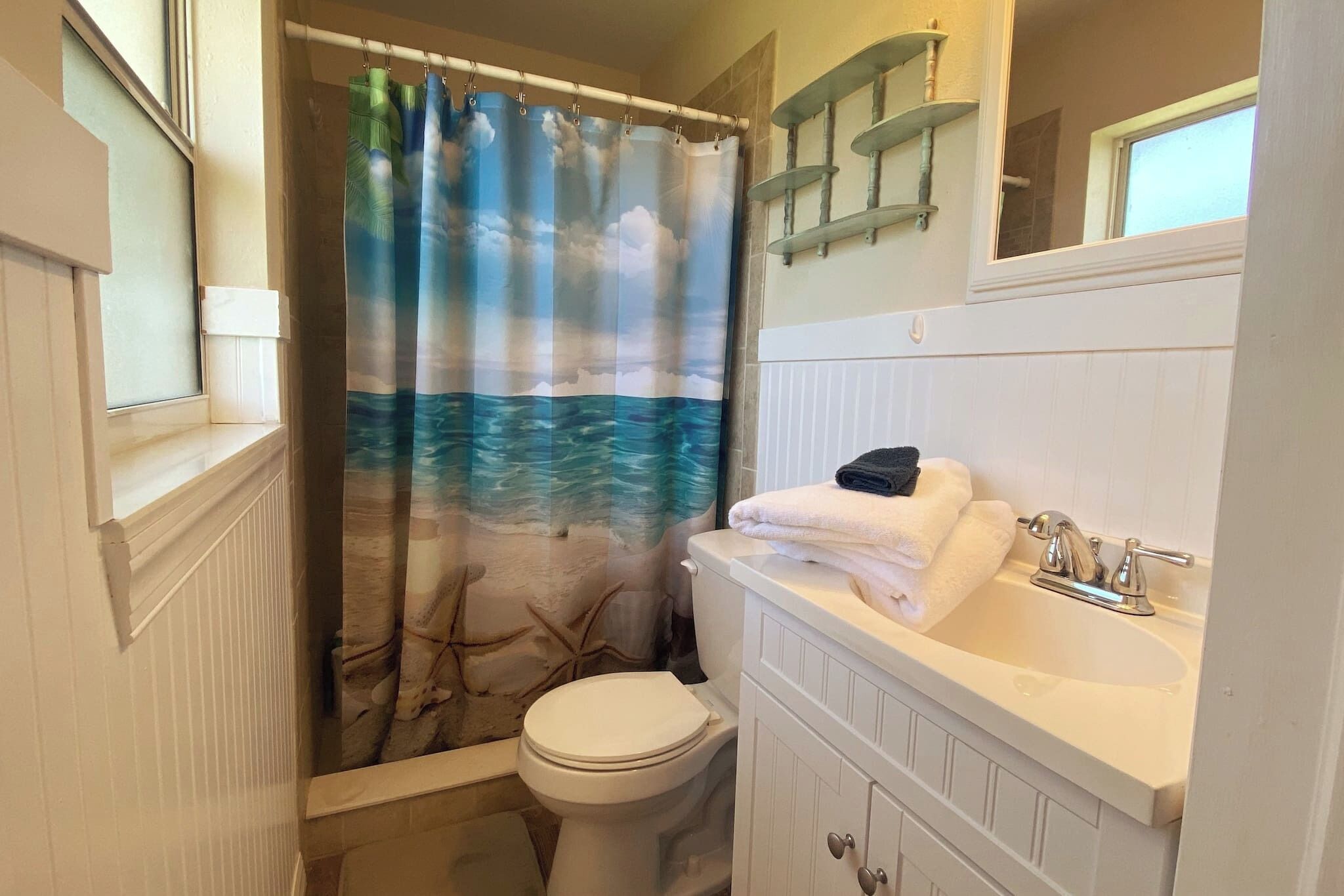Combined shower/tub, hair dryer, towels, soap