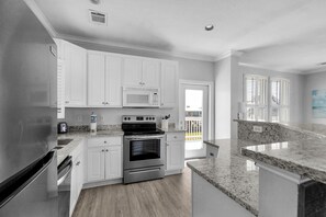 Fridge, microwave, oven, stovetop - Bella Isla - Gulf Beachside, 2 Bedrooms, 2.5 Baths, Pet Friendly, Sleeps 10. (Dauphin Island)