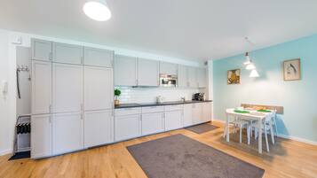 Apartment (A 007) | Private kitchenette | Fridge, stovetop, electric kettle, cookware/dishes/utensils