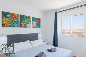 1 slaapkamer, een strijkplank/strijkijzer, reisbedje, gratis wifi