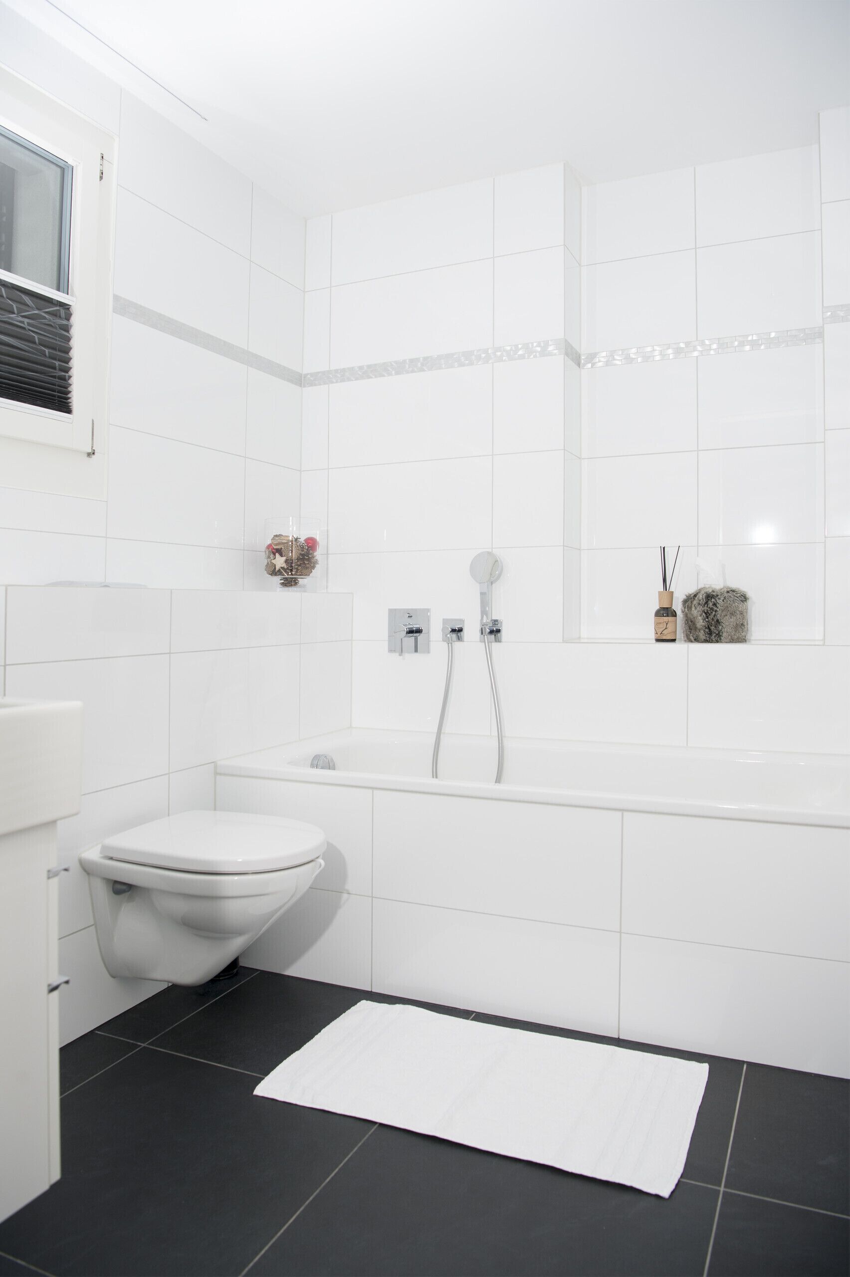 Bathtub, hair dryer, towels