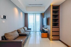 TV - Elegant And Spacious 3Br Apartment At Casa Grande Residence (Jakarta)