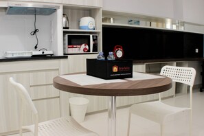 TV - Comfort And Minimalist Studio At Azalea Suites Apartment (Cikarang)
