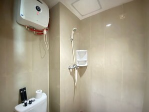 Shower, free toiletries, towels - Bohemian Studio Room Taman Melati Jatinangor Apartment (Hegarmanah)