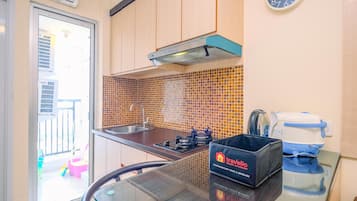 Fridge, stovetop, cookware/dishes/utensils