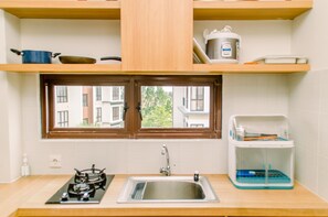 Fridge, stovetop, cookware/dishes/utensils - Best Deal And Comfy 2Br At Asatti Apartment Vanya Park (Pagedangan)