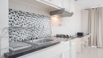 Fridge, stovetop, cookware/dishes/utensils