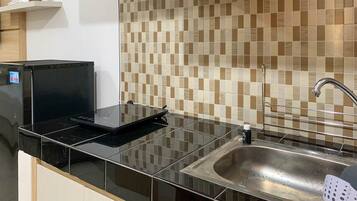 Fridge, stovetop, cookware/dishes/utensils