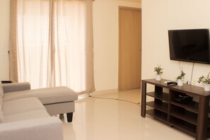 TV - Warm And Cozy Living 3Br At Meikarta Apartment (Cikarang)