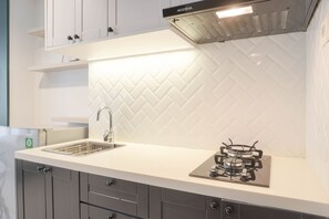 Fridge, stovetop, cookware/dishes/utensils