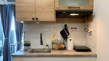 Fridge, stovetop, cookware/dishes/utensils