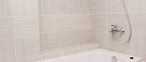 Shower, free toiletries, towels, soap