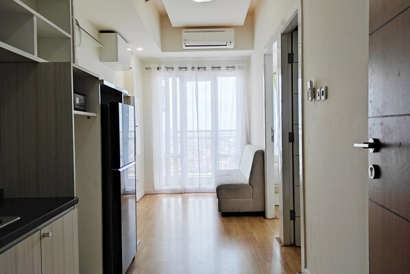 Interior - Cozy Stay And Homey 2Br Vida View Apartment (Makassar)