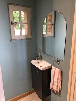 Bathtub, hair dryer, towels, soap