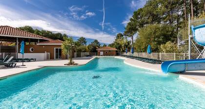 Chalet 'Bois lac de Biscarrosse' avec piscine chauffée, jardin privé & Wi-Fi