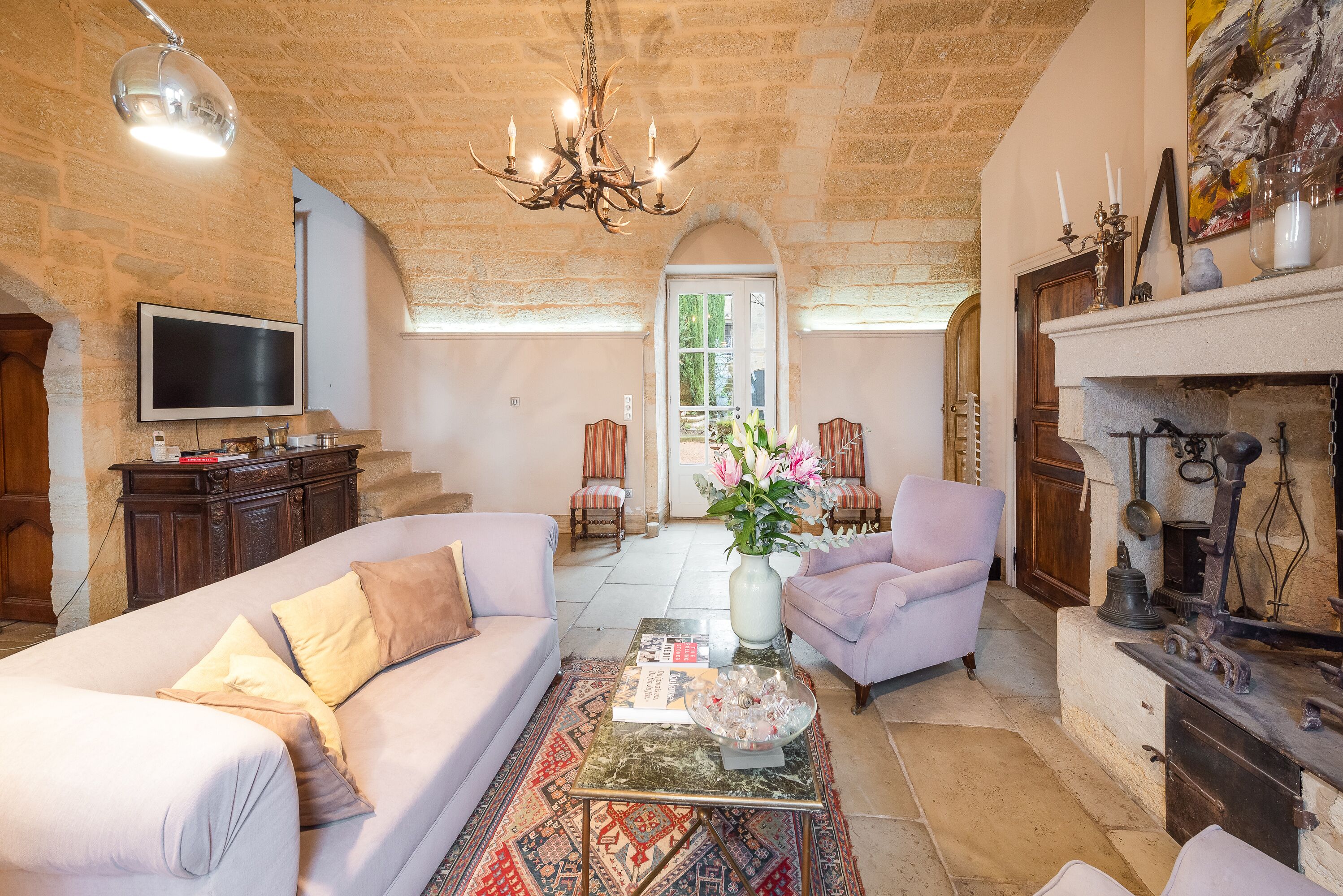 TV, fireplace, books