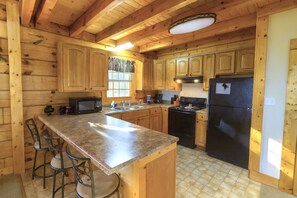 Microwave, dishwasher, coffee/tea maker, cookware/dishes/utensils - Family-Friendly Cabin | Hot Tub, Views, Game Loft & FREE Tickets Daily! (Sevierville)