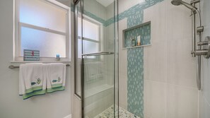 Shower, hair dryer, towels