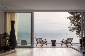 Royal-Villa, 4 Schlafzimmer, eigener Pool, Meerblick | Wohnzimmer | Smart-TV, Kamin, Fußbodenheizung