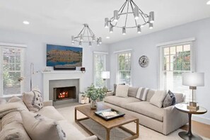 Smart TV, fireplace, books, music library