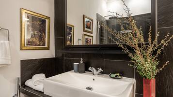 Bathtub, hair dryer, towels