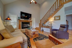 Smart TV, fireplace, table football, books