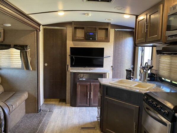 Microwave, stovetop, coffee/tea maker, toaster