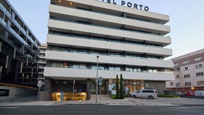 A modern hotel building with the name "HOTEL PORTO" prominently displayed. - Hedera Estate, Hedera A15 (Dubrovnik)
