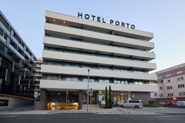 A modern hotel building with the name "HOTEL PORTO" prominently displayed. - Hedera Estate, Hedera A15 - Free EV Charging (Dubrovnik)