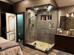 Shower, hair dryer, towels, shampoo