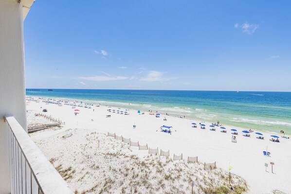 Enjoy breathtaking ocean views from this beachfront balcony.