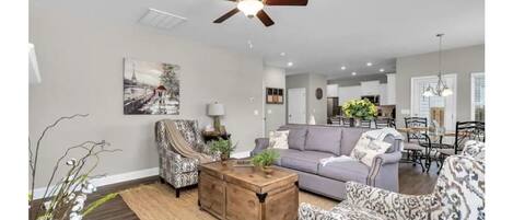 Smart TV, fireplace, books, printers